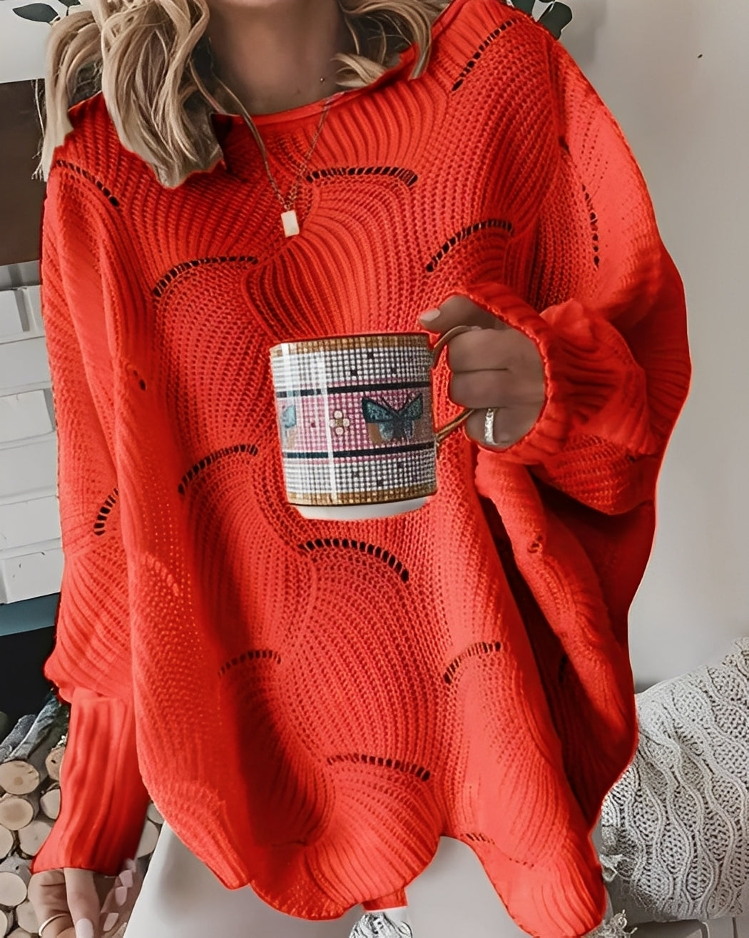 Kassandra - Elegante maglione femminile tagliato