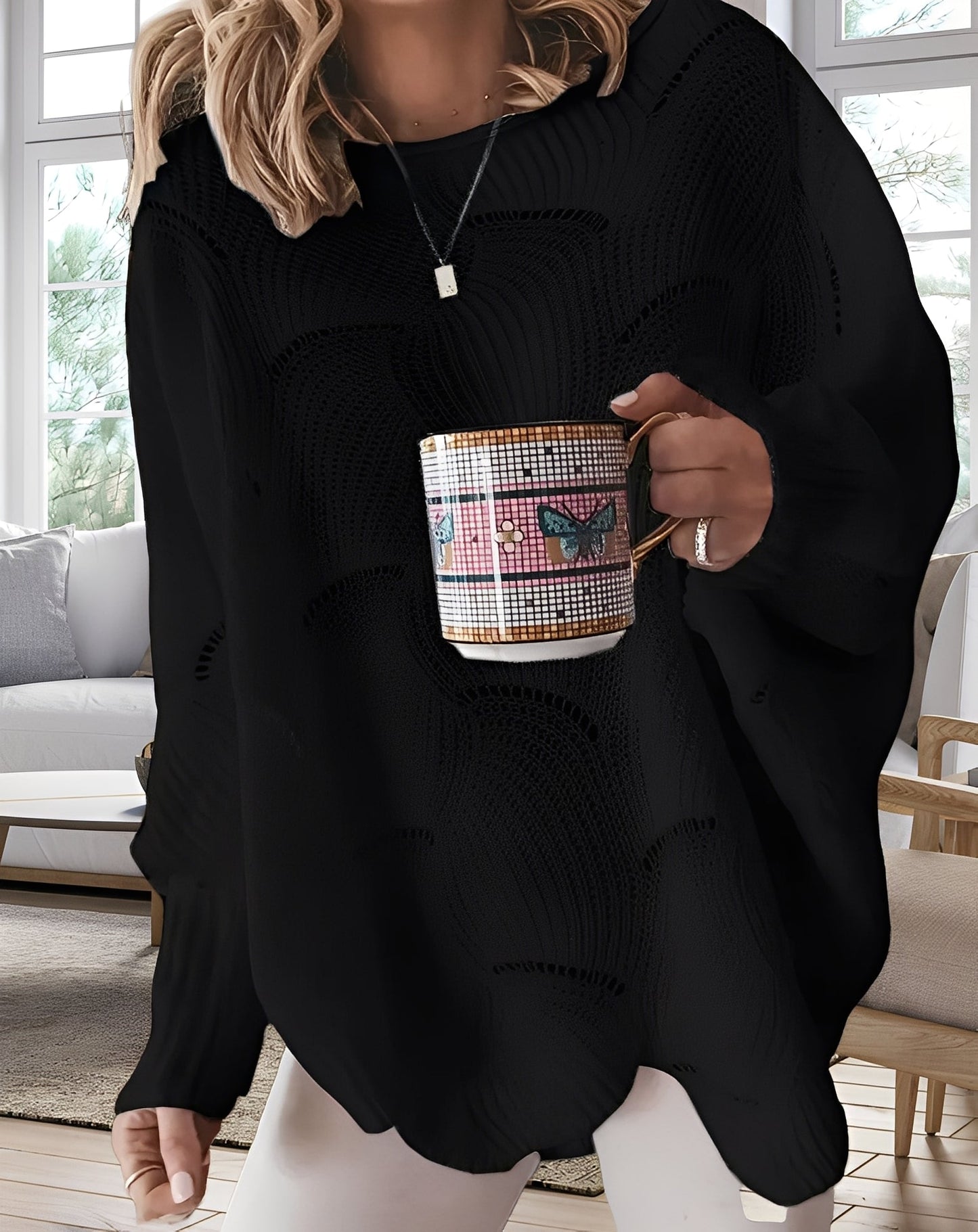 Kassandra - Elegante maglione femminile tagliato