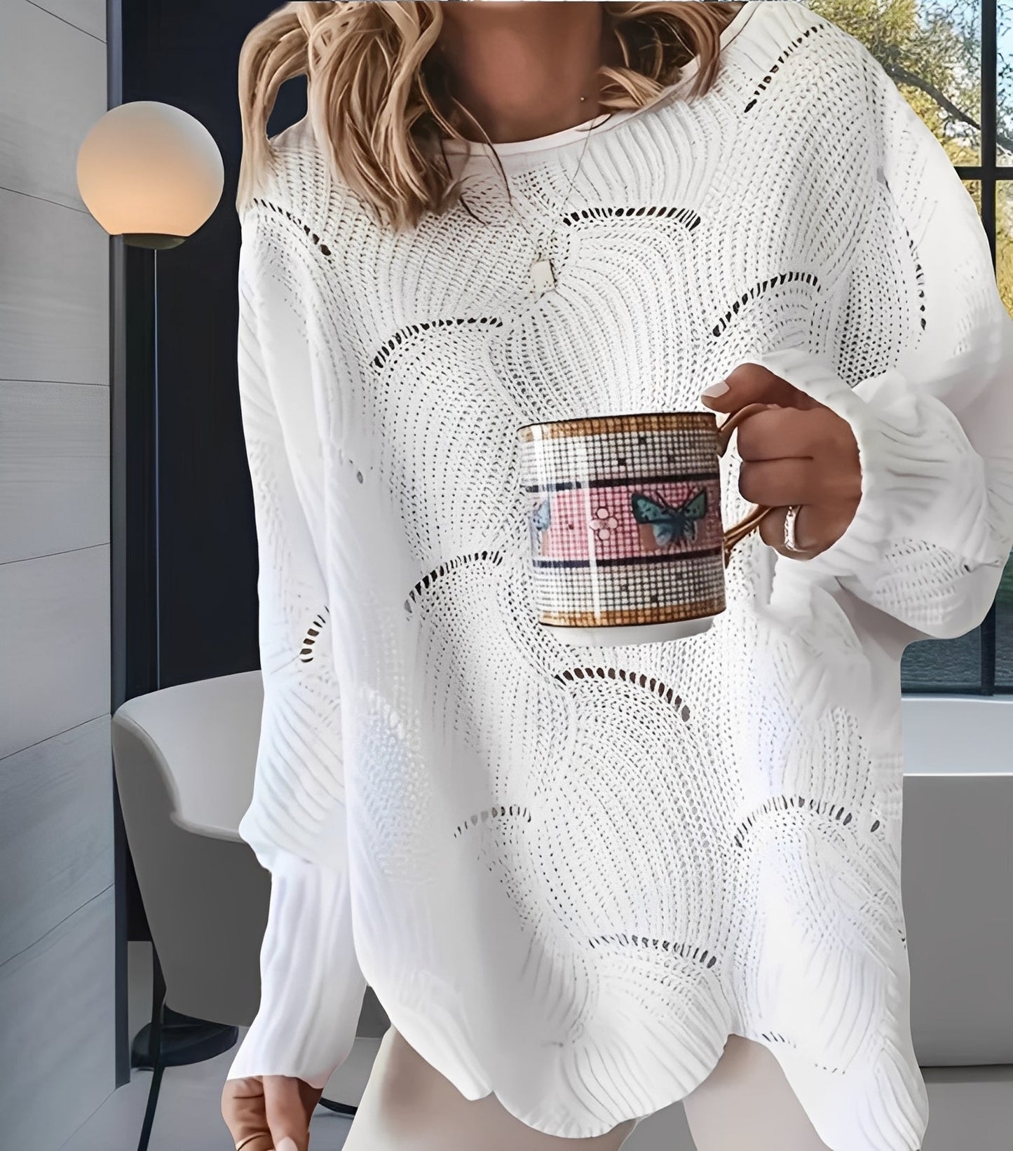 Kassandra - Elegante maglione femminile tagliato